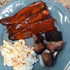 Brisket with Texas sauce, burnt ends, and cole slaw